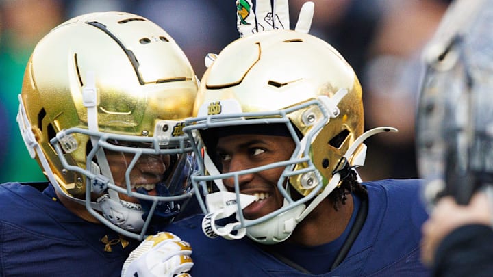Notre Dame running back Jadarian Price celebrates after scoring a touchdown in the first half.