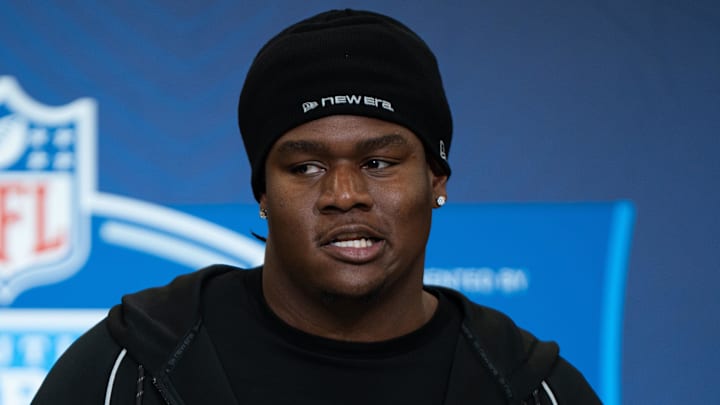 Kentucky offensive lineman Jalen Farmer (OL23) speaks to members of the media during the NFL Combine.