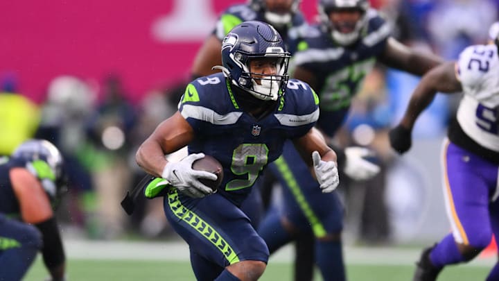 Dec 22, 2024; Seattle, Washington, USA; Seattle Seahawks running back Kenneth Walker III (9) carries the ball against the Minnesota Vikings during the second half at Lumen Field. Mandatory Credit: Steven Bisig-Imagn Images