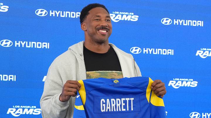 Jun 2, 2026; Woodland Hills, CA, USA; Los Angeles Rams defensive end Myles Garrett (95) poses with jersey at press conference at Rams Practice Facility. Mandatory Credit: Kirby Lee-Imagn Images Jun 2, 2026; Woodland Hills, CA, USA; Los Angeles Rams defensive end Myles Garrett (95) poses with jersey at press conference at Rams Practice Facility. Mandatory Credit: Kirby Lee-Imagn Images
