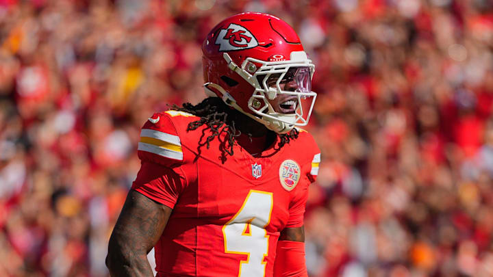 Oct 19, 2025; Kansas City, Missouri, USA; Kansas City Chiefs wide receiver Rashee Rice (4) celebrates after scoring a touchdown against the Las Vegas Raiders during the first quarter of the game at GEHA Field at Arrowhead Stadium. Mandatory Credit: Jay Biggerstaff-Imagn Images