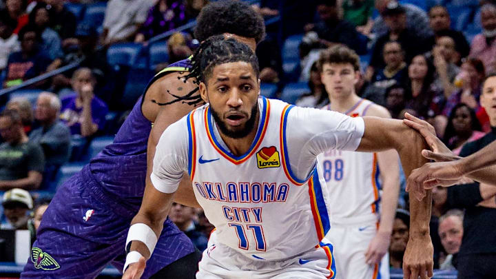 Apr 13, 2025; New Orleans, Louisiana, USA; Oklahoma City Thunder guard Isaiah Joe (11) dribbles against New Orleans Pelicans guard Antonio Reeves (12) during the first half at Smoothie King Center. Mandatory Credit: Stephen Lew-Imagn Images Apr 13, 2025; New Orleans, Louisiana, USA; Oklahoma City Thunder guard Isaiah Joe (11) dribbles against New Orleans Pelicans guard Antonio Reeves (12) during the first half at Smoothie King Center. Mandatory Credit: Stephen Lew-Imagn Images