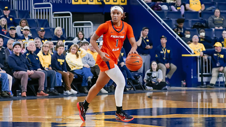 Illinois guard Aaliyah Guyton (1) looks over the floor during the Illini's 85-69 loss to No. 8 Michigan on Thursday at Crisler Center in Ann Arbor, Michigan.