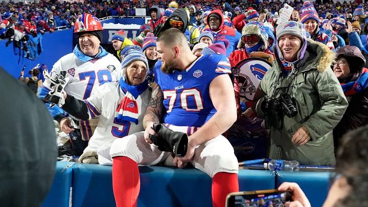 Buffalo Bills lineman Alec Anderson sits and visits with fans following the Bills win over the Jets in their last regular-season game at Highmark Stadium in Orchard Park Sunday, Jan. 4, 2026