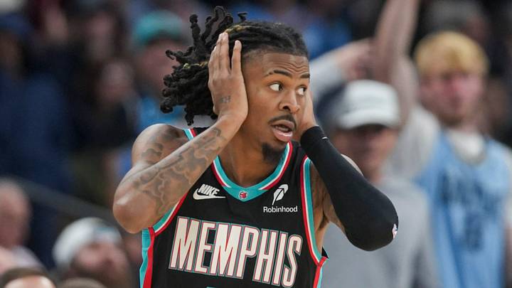 Grizzlies' Ja Morant (12) reacts after making a 3-pointer during the home opener against the New Orleans Pelicans at FedExForum on October 22, 2025.