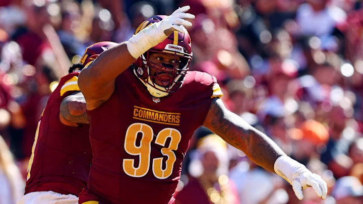 Oct 6, 2024; Landover, Maryland, USA; Washington Commanders defensive tackle Jonathan Allen (93) celebrates after a tackle during the second quarter against the Cleveland Browns at NorthWest Stadium. Mandatory Credit: Peter Casey-Imagn Images