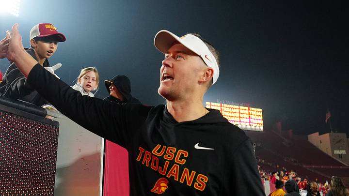 Southern California Trojans head coach Lincoln Riley celebrates with fans after the game against the UCLA Bruins at United Airlines Field at Los Angeles Memorial Coliseum Southern California Trojans head coach Lincoln Riley celebrates with fans after the game against the UCLA Bruins at United Airlines Field at Los Angeles Memorial Coliseum