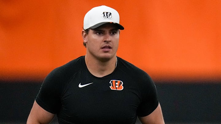 Cincinnati Bengals defensive end Trey Hendrickson (91) directs a drill during a preseason training camp practice in downtown Cincinnati on Thursday, July 31, 2025.