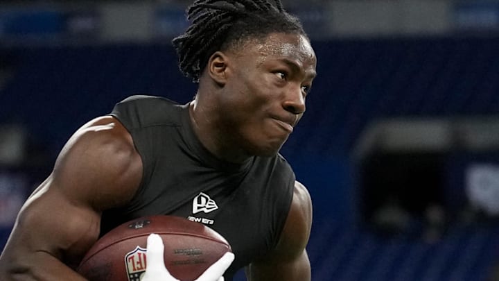 Nebraska running back Emmett Johnson goes through drills at the Scouting Combine.