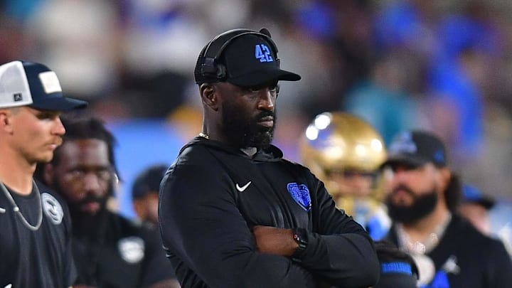 Aug 30, 2025; Pasadena, California, USA; UCLA Bruins head coach DeShaun Foster watches game action against the Utah Utes during the second half at Rose Bowl. Mandatory Credit: Gary A. Vasquez-Imagn Images