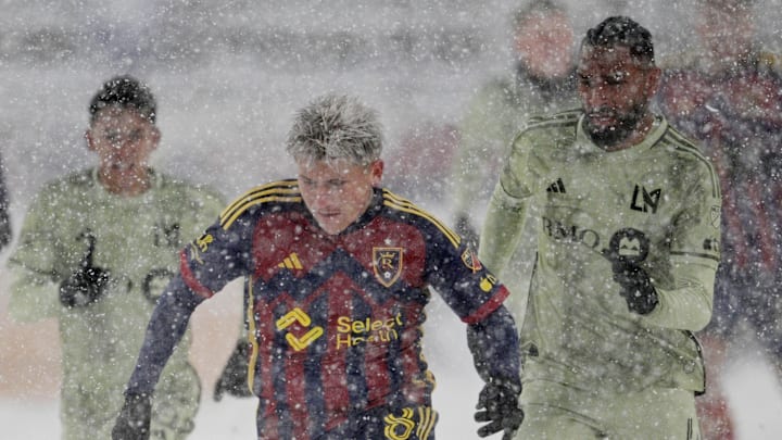 USMNT midfielder Diego Luna (middle) played in a snow-filled game for Real Salt Lake against LAFC in 2024. 