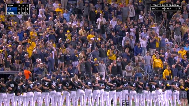 The Mountaineers traditionally sing 'Country Roads' after a WVU win. The Mountaineers traditionally sing 'Country Roads' after a WVU win.