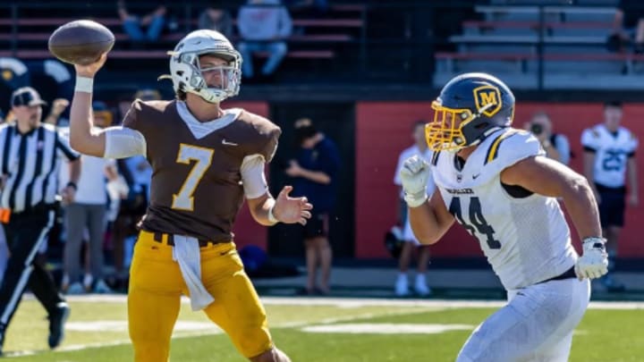 Mount Carmel quarterback looks to pass during his team's 43-42 win over Archbishop Moeller in Ohio.