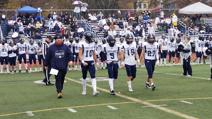 Portland Bulldogs walking up at the 2023 Maine high school football state championships. 
