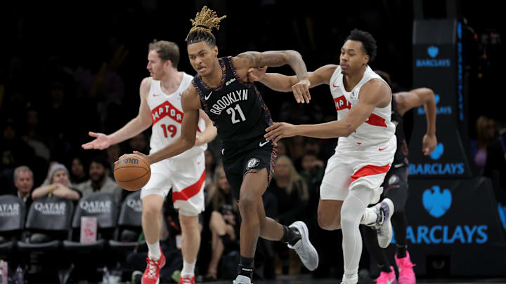 Nov 11, 2025; Brooklyn, New York, USA; Brooklyn Nets forward Noah Clowney (21) brings the ball up court against Toronto Raptors forward Scottie Barnes (4) during the third quarter at Barclays Center. Mandatory Credit: Brad Penner-Imagn Images Nov 11, 2025; Brooklyn, New York, USA; Brooklyn Nets forward Noah Clowney (21) brings the ball up court against Toronto Raptors forward Scottie Barnes (4) during the third quarter at Barclays Center. Mandatory Credit: Brad Penner-Imagn Images