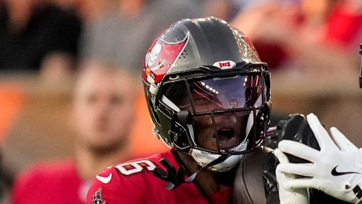 Tampa Bay Buccaneers cornerback Keenan Isaac (16) intercepts a pass intended for Cincinnati Bengals wide receiver Kwamie Lassiter II (18) in the second quarter of the NFL Preseason Week 1 game between the Cincinnati Bengals and the Tampa Bay Buccaneers at Paycor Stadium in downtown Cincinnati on Saturday, Aug. 10, 2024. Tampa Bay Buccaneers cornerback Keenan Isaac (16) intercepts a pass intended for Cincinnati Bengals wide receiver Kwamie Lassiter II (18) in the second quarter of the NFL Preseason Week 1 game between the Cincinnati Bengals and the Tampa Bay Buccaneers at Paycor Stadium in downtown Cincinnati on Saturday, Aug. 10, 2024.