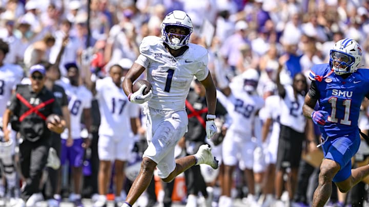 Sep 20, 2025; Fort Worth, Texas, USA; TCU Horned Frogs wide receiver Eric McAlister (1) runs with the ball after a catch and scores a touchdown against the SMU Mustangs during the second half at Amon G. Carter Stadium. Mandatory Credit: Jerome Miron-Imagn Images Sep 20, 2025; Fort Worth, Texas, USA; TCU Horned Frogs wide receiver Eric McAlister (1) runs with the ball after a catch and scores a touchdown against the SMU Mustangs during the second half at Amon G. Carter Stadium. Mandatory Credit: Jerome Miron-Imagn Images