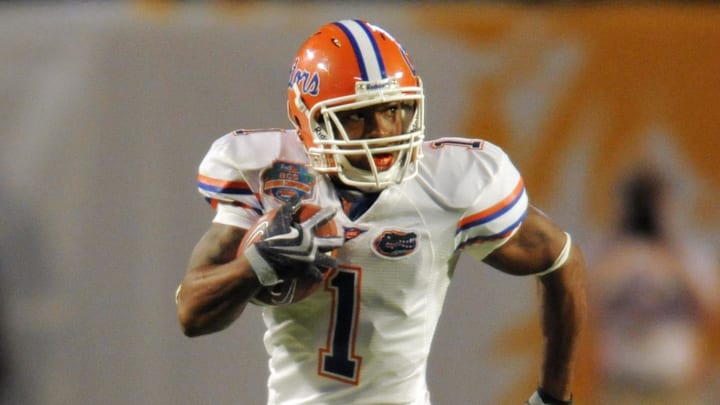 Jan 8, 2009; Miami, FL, USA; Florida Gators wide receiver Percy Harvin (1) returns a kick during the fourth quarter of the 2009 BCS Championship Game against the Oklahoma Sooners at Dolphin Stadium. Mandatory Credit: James Lang-Imagn Images Jan 8, 2009; Miami, FL, USA; Florida Gators wide receiver Percy Harvin (1) returns a kick during the fourth quarter of the 2009 BCS Championship Game against the Oklahoma Sooners at Dolphin Stadium. Mandatory Credit: James Lang-Imagn Images