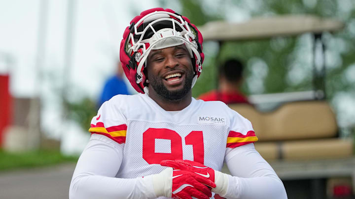 Jul 22, 2025; St. Joseph, MO, USA; Kansas City Chiefs defensive end Felix Anudike-Uzomah (91) walks down the hill to the practice fields during training camp at Missouri Western State University. Mandatory Credit: Denny Medley-Imagn Images
