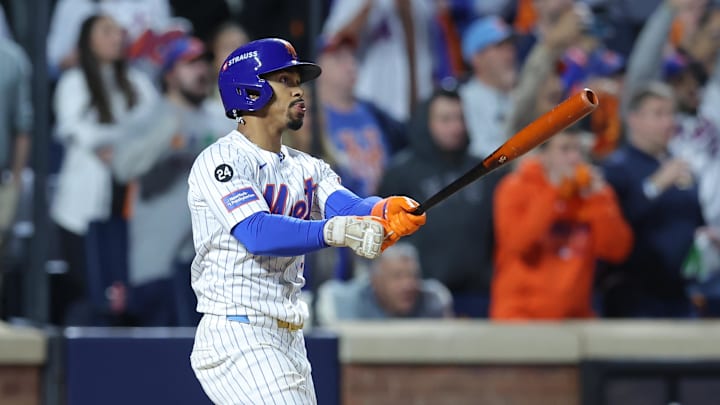 New York Mets shortstop Francisco Lindor hits a grand slam against the Philadelphia Phillies in the sixth inning in Game 4 of the NLDS at Citi Field. 