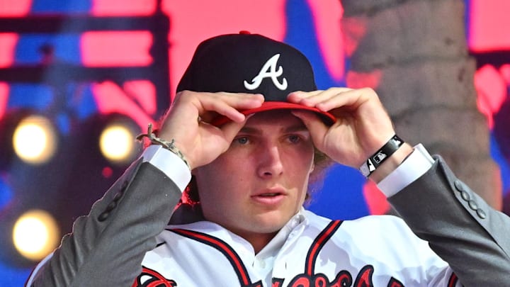 Jul 17, 2022; Los Angeles, CA, USA; Former Atlanta Braves player Fred McGriff presents JR Ritchie right with his jersey after he was selected by the Atlanta Braves as the 35th pick of the MLB draft at XBox Plaza at LA Live. Mandatory Credit: Jayne Kamin-Oncea-Imagn Images Jul 17, 2022; Los Angeles, CA, USA; Former Atlanta Braves player Fred McGriff presents JR Ritchie right with his jersey after he was selected by the Atlanta Braves as the 35th pick of the MLB draft at XBox Plaza at LA Live. Mandatory Credit: Jayne Kamin-Oncea-Imagn Images