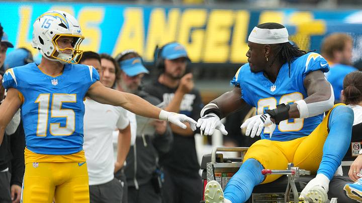 Sep 20, 2026; Inglewood, California, USA; Los Angeles Chargers wide receiver Ladd McConkey (15) high-fives tight end David Njoku (83) as he is carted off the field against the Las Vegas Raiders during the first half at SoFi Stadium. Mandatory Credit: Kirby Lee-Imagn Images Sep 20, 2026; Inglewood, California, USA; Los Angeles Chargers wide receiver Ladd McConkey (15) high-fives tight end David Njoku (83) as he is carted off the field against the Las Vegas Raiders during the first half at SoFi Stadium. Mandatory Credit: Kirby Lee-Imagn Images