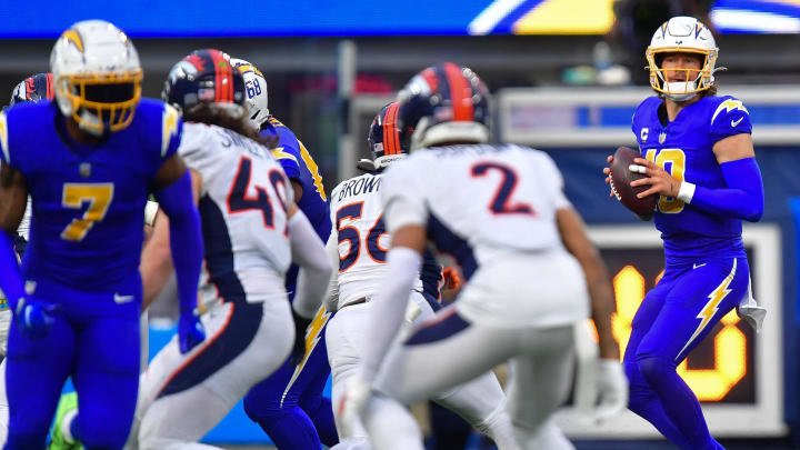 Dec 10, 2023; Inglewood, California, USA; Los Angeles Chargers quarterback Justin Herbert (10) drops back to pass against the Denver Broncos during the first half at SoFi Stadium.