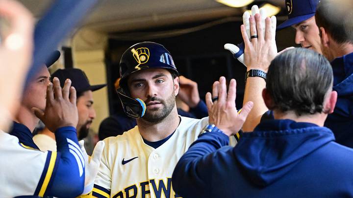 Aug 20, 2026; Milwaukee, Wisconsin, USA;  Milwaukee Brewers center fielder Garrett Mitchell (5) is greeted in the dugout after hitting a solo home run in the eighth inning against the Seattle Mariners at American Family Field.  Mandatory Credit: Benny Sieu-Imagn Images
