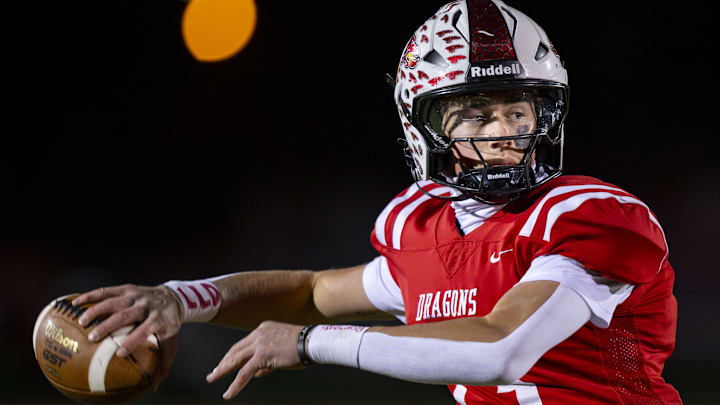 New Palestine High School senior Jacob Davis (13) is firmly holding the Dragons in the top 5.