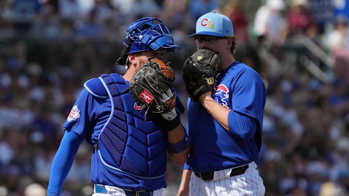 Mar 1, 2026; Mesa, Arizona, USA; Chicago Cubs catcher Carson Kelly (15) talks to pitcher Corbin Martin (38) in the third inning during a game against the Chicago White Sox at Sloan Park. Mandatory Credit: Rick Scuteri-Imagn Images