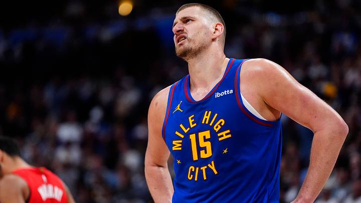 Mar 22, 2026; Denver, Colorado, USA; Denver Nuggets center Nikola Jokic (15) reacts in the second half against the Portland Trail Blazers at Ball Arena. Mandatory Credit: Ron Chenoy-Imagn Images