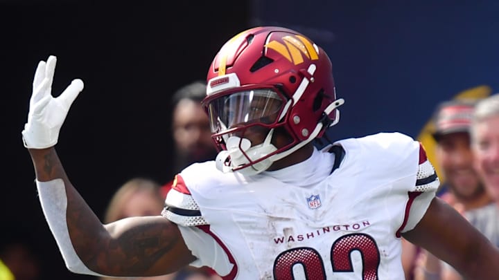 Washington Commanders running back Jacory Croskey-Merritt celebrates after scoring against the Los Angeles Chargers.
