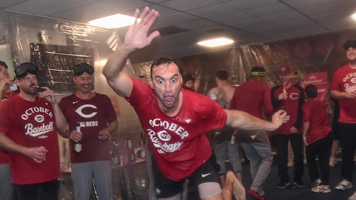 Sep 28, 2025; Milwaukee, Wisconsin, USA; Cincinnati Reds pitcher Brent Suter (31) shows his dancing skills after the Reds clinched a playoff spot after the game against the Milwaukee Brewers at American Family Field. Mandatory Credit: Benny Sieu-Imagn Images