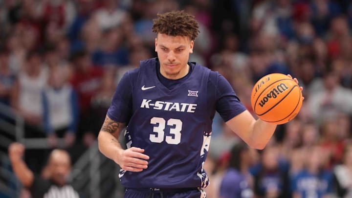 Kansas State Wildcats guard Coleman Hawkins (33) dribbles down court in the second half of the Sunflower Showdown game against the Kansas Jayhawks inside Allen Fieldhouse Saturday, Jan. 18, 2025.