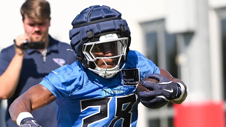 Tennessee Titans running back Kalel Mullings runs with the ball during training camp. Mandatory Credit: Steve Roberts-Imagn Images Tennessee Titans running back Kalel Mullings runs with the ball during training camp. Mandatory Credit: Steve Roberts-Imagn Images