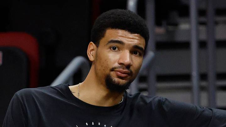 Miami Heat center Kel'el Ware (7) watches warm-ups from the bench against the Detroit Pistons at Kaseya Center on March 8, 2026.