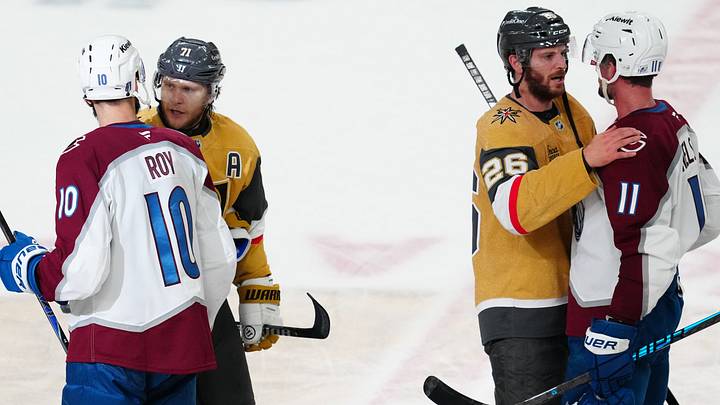 May 26, 2026; Las Vegas, Nevada, USA; Colorado Avalanche center Nicolas Roy (10) and center Brock Nelson (11) congratulate Vegas Golden Knights center William Karlsson (71) and center Nic Dowd (26) after the loss in game four of the Western Conference Final of the 2026 Stanley Cup Playoffs at T-Mobile Arena. Mandatory Credit: Stephen R. Sylvanie-Imagn Images