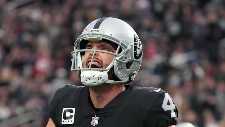 Dec 18, 2022; Paradise, Nevada, USA; Las Vegas Raiders quarterback Derek Carr (4) celebrates after a touchdown against the New England Patriots in the first half at Allegiant Stadium. Mandatory Credit: Kirby Lee-Imagn Images
