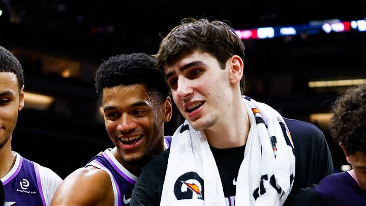 Dec 21, 2025; Sacramento, California, USA; Sacramento Kings forward Keegan Murray (13) and center Dylan Cardwell (32) and center Maxime Raynaud (42) and guard Nique Clifford (5) prepare to light the beam in celebration of their win against the Houston Rockets at Golden 1 Center. Mandatory Credit: Sergio Estrada-Imagn Images