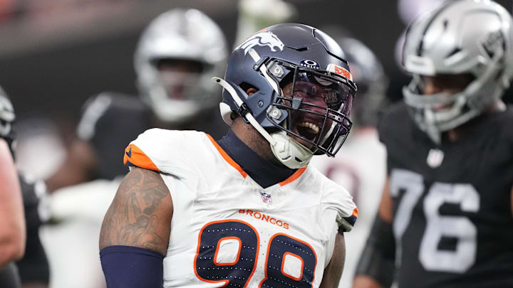 Dec 7, 2025; Paradise, Nevada, USA;  Denver Broncos defensive end John Franklin-Myers (98) reacts after a sack against the Las Vegas Raiders during the first half at Allegiant Stadium. Mandatory Credit: Kirby Lee-Imagn Images
