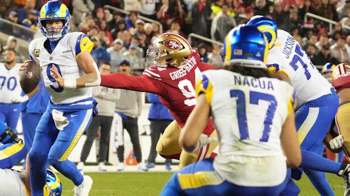 Dec 12, 2024; Santa Clara, California, USA; Los Angeles Rams quarterback Matthew Stafford (9) looks to pass the ball to wide receiver Puka Nacua (17) during the fourth quarter at Levi's Stadium. Mandatory Credit: Kelley L Cox-Imagn Images