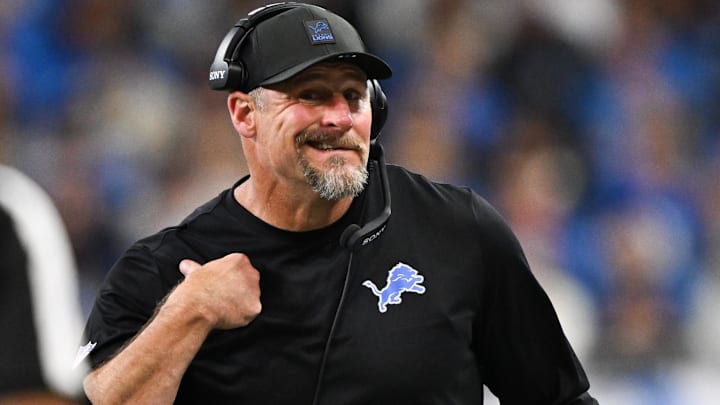 Nov 2, 2025; Detroit, Michigan, USA; Detroit Lions head coach Dan Campbell struggles to hear an official on a penalty in the fourth quarter against the Minnesota Vikings at Ford Field.