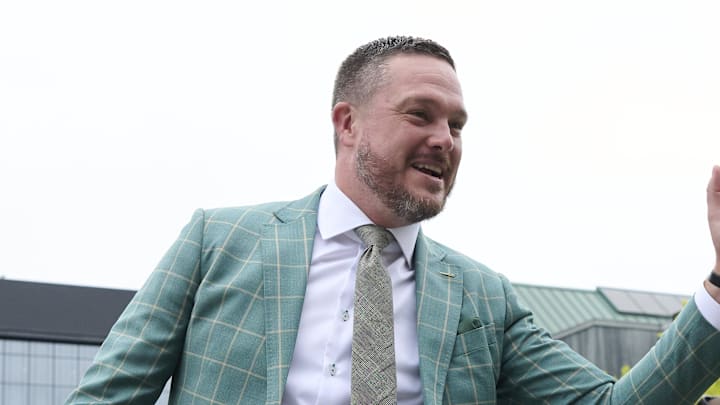 Sep 6, 2025; Eugene, Oregon, USA; Oregon Ducks head coach Dan Lanning greets fans as the Oregon Ducks football team walk to the locker room before a game against the Oklahoma State Cowboys at Autzen Stadium. Mandatory Credit: Troy Wayrynen-Imagn Images