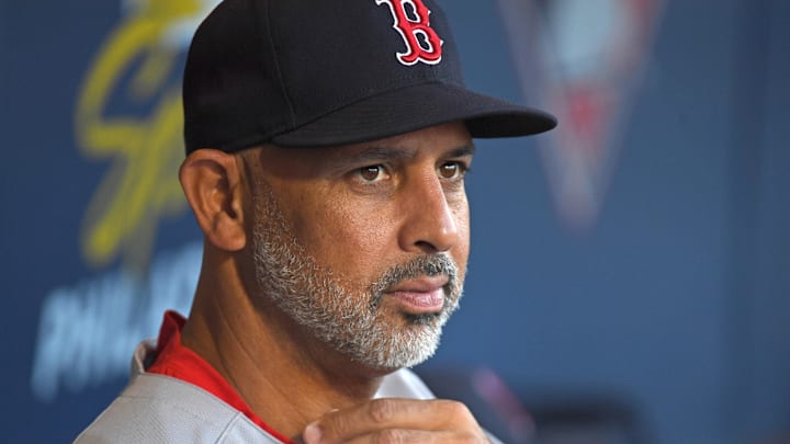 Jul 21, 2025; Philadelphia, Pennsylvania, USA; Boston Red Sox manager Alex Cora (13) in the dugout against the Philadelphia Phillies at Citizens Bank Park. Mandatory Credit: Eric Hartline-Imagn Images