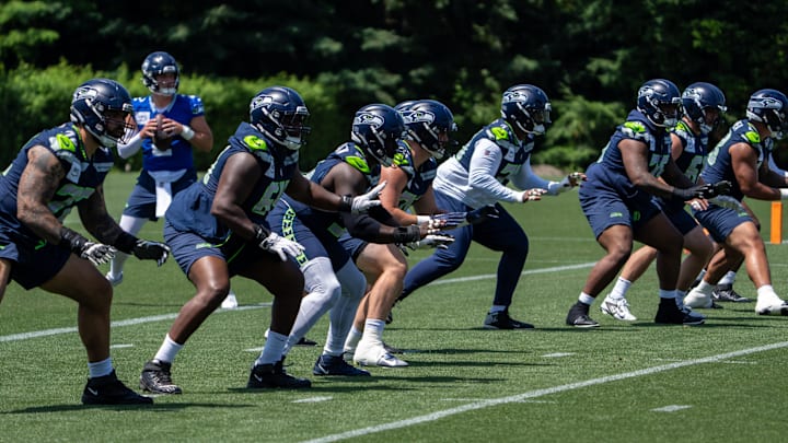 Seattle Seahawks offensive line units take part in drills during mini-camp at Virginia Mason Athletic Center. Seattle Seahawks offensive line units take part in drills during mini-camp at Virginia Mason Athletic Center.