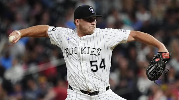 Jul 22, 2025; Denver, Colorado, USA; Colorado Rockies relief pitcher Seth Halvorsen (54) delivers a pitch in the ninth inning against the St. Louis Cardinals at Coors Field.