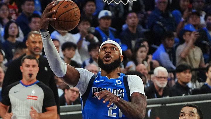 Basketball - NBA - Preseason - China Games 2026 - Dallas Mavericks v Houston Rockets - The Venetian Arena, Macao, China - October 9, 2026 Dallas Mavericks' Daniel Gafford scores a basket REUTERS/Lam Yik