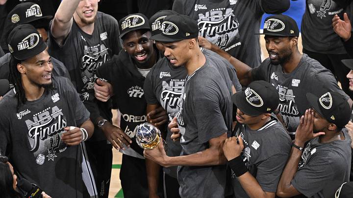 May 30, 2026; Oklahoma City, Oklahoma, USA; San Antonio Spurs forward Victor Wembanyama (1) celebrates with the MVP trophy after defeating the Oklahoma City Thunder in Game 7 of the Western Conference Finals for the 2026 NBA Playoffs at Paycom Center.