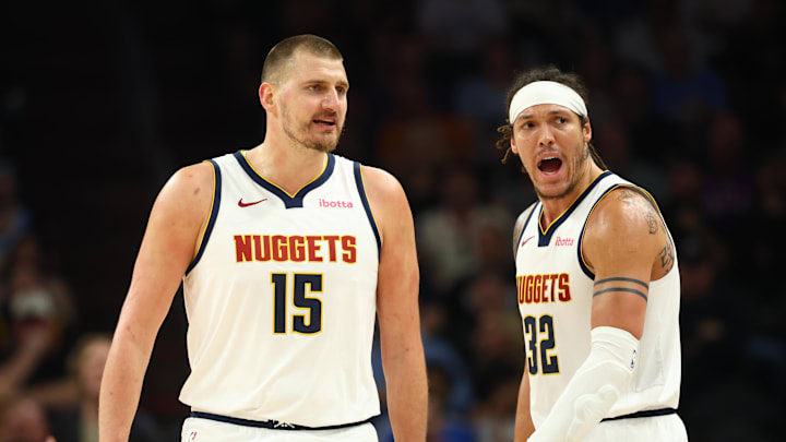 Mar 24, 2026; Phoenix, Arizona, USA; Denver Nuggets center Nikola Jokic (15) and forward Aaron Gordon (32) against the Phoenix Suns at Mortgage Matchup Center.