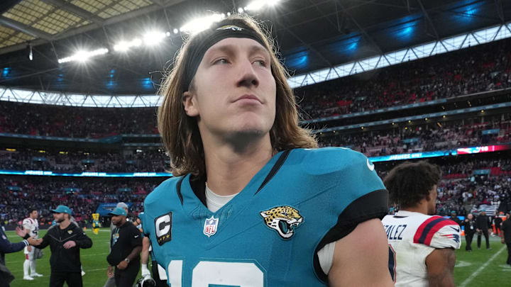 Oct 20, 2024; London, United Kingdom; Jacksonville Jaguars quarterback Trevor Lawrence (16) reacts after an NFL International Series game against the New England Patriots at Wembley Stadium. Mandatory Credit: Kirby Lee-Imagn Images